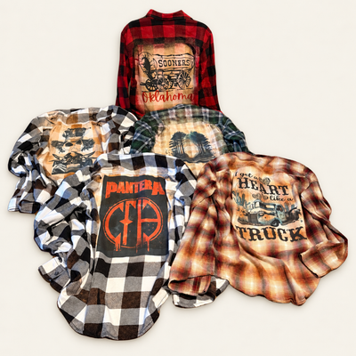 Five of Marilu's custom bleached flannels with back designs on warm ivory