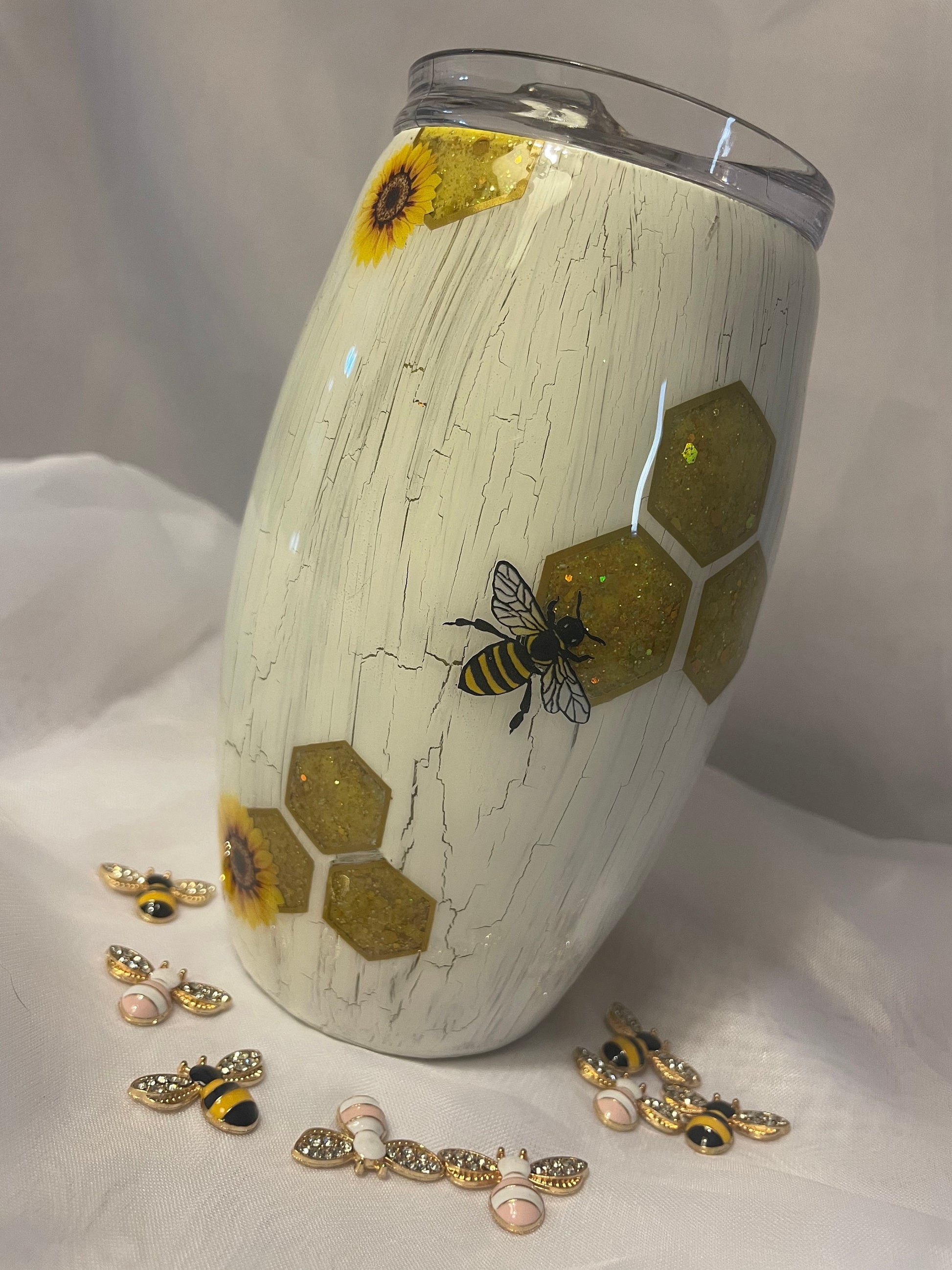 Bee tumbler with 3D bees embellishment and sunflowers (choose your cup and size), honey comb peekaboo glitter with white crackle effect.